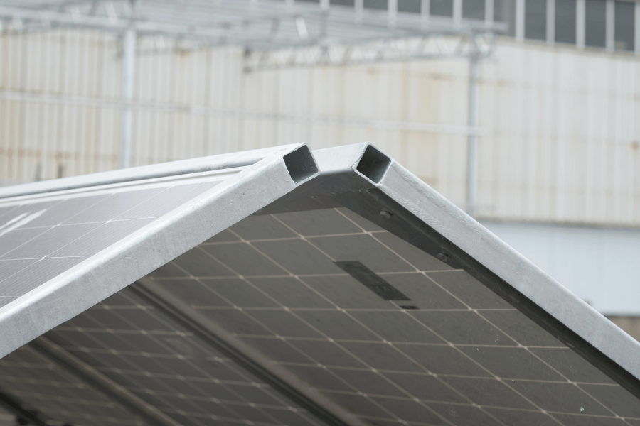 Close-up of an EMS interface showing real-time performance data of a solar and BESS system for telecom